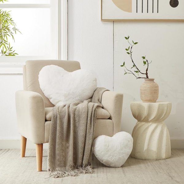 coussin blanc en forme de cœur