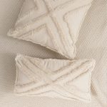 coussin tufté à franges